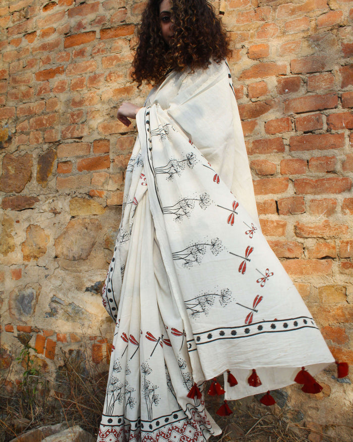 Handcrafted Ivory Saree with Artistic Motif & Tassel Detailing