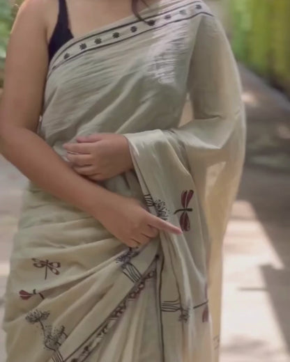 Handcrafted Ivory Saree with Artistic Motif & Tassel Detailing